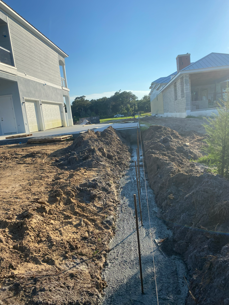 Concrete block stem wall being filled with rebar in Northeast Florida